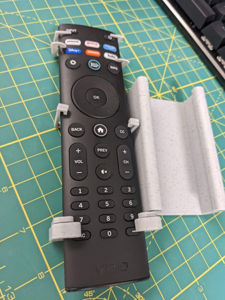 3d printed remote control holder being manufactured